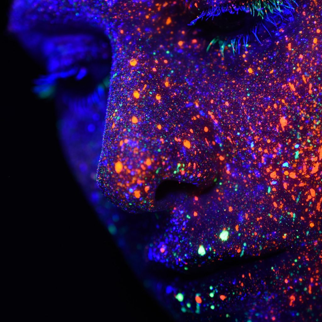 Woman's Face With Colored Points Of Light